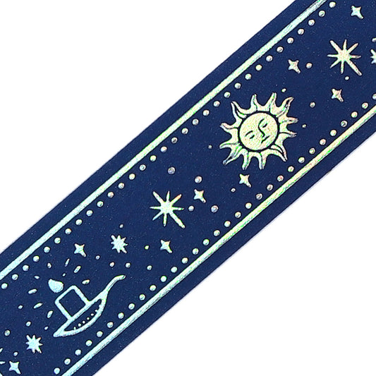 A roll of BGM washi tape in deep midnight blue featuring celestial motifs—sun, moon, hourglass, and stars—accented with shimmering foil from the Grimoire of Stars collection.