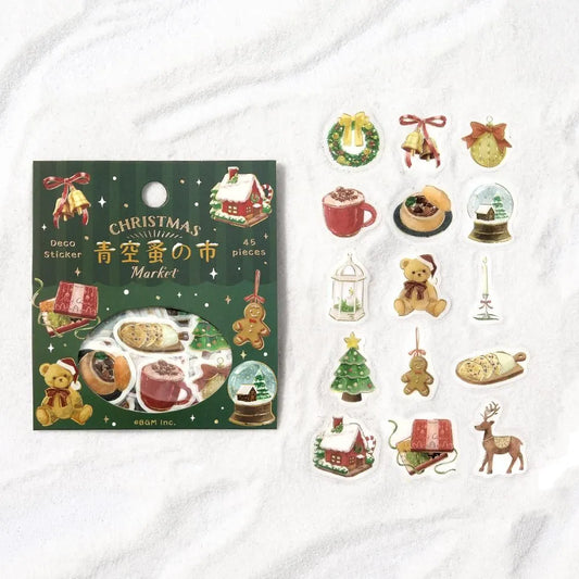 BGM Christmas Market flake stickers featuring foil-stamped market stalls and holiday details.