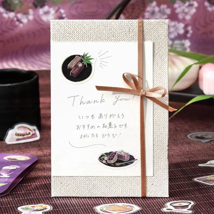 Purple café-themed flake sticker sheet featuring traditional sweets, tea cups and parfaits with metallic foil details.