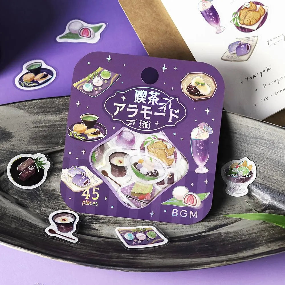 Purple café-themed flake sticker sheet featuring traditional sweets, tea cups and parfaits with metallic foil details.
