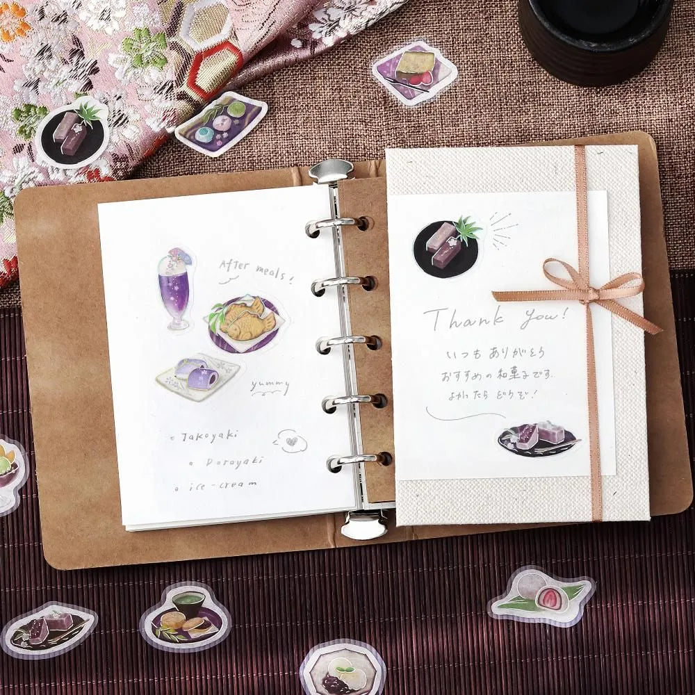 Purple café-themed flake sticker sheet featuring traditional sweets, tea cups and parfaits with metallic foil details.