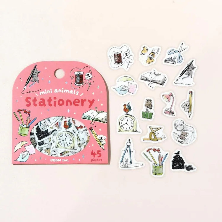 BGM Foil Stamping Flake Seal – Mini Mini Animals: Stationery with 45 washi stickers featuring adorable animals interacting with notebooks, pens, scissors, and other stationery items—enhanced with gold foil accents and a textured finish.