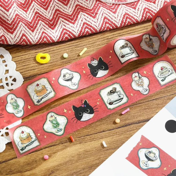 BGM Foil Stamping Masking Tape – Black Cat Café: Café Frame 20mm washi tape roll designed with cozy illustrations of café scenes, a black cat, and gold foil accents.