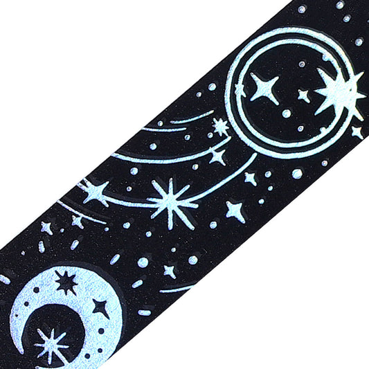A roll of black washi tape with constellations and glowing foil stars from the Grimoire of Stars Darkness edition.