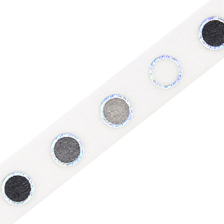 A slim 5mm wide washi tape roll with metallic foil round patterns, perfect for decorating planners, journals, and crafts with a clean modern touch.