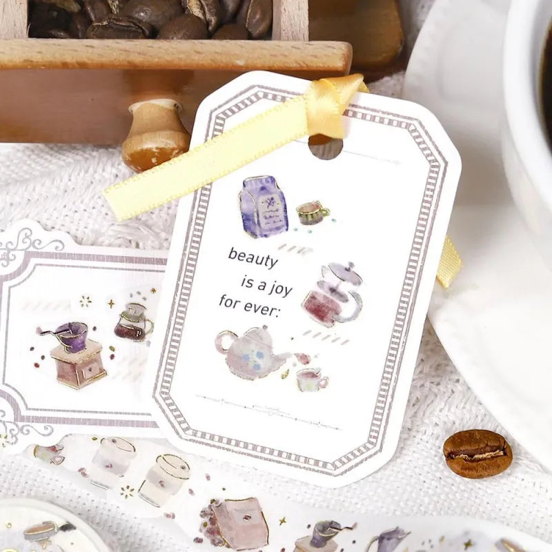 BGM Foil Stamping Masking Tape – Life: Enjoy CAFE 15mm washi tape roll featuring cozy coffee shop illustrations and shimmering gold foil highlights, it's perfect for journaling, decorating, and café lovers alike.