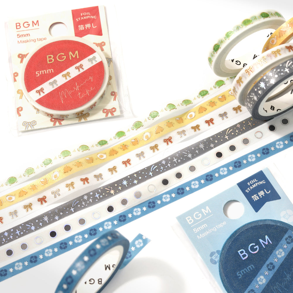 A roll of washi tape featuring delicate night-blooming flowers accented with shimmering metallic foil, adding a moonlit elegance to journals, planners, and craft projects.