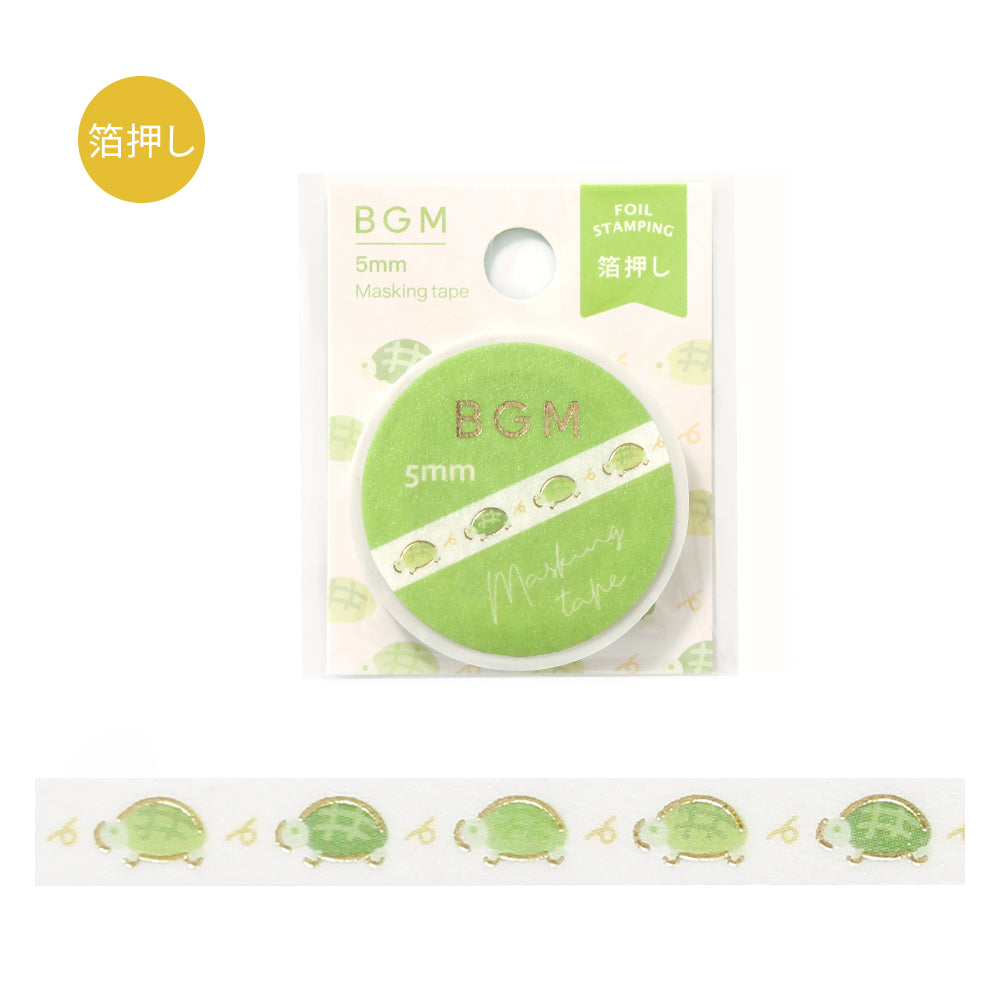 A slim roll of washi tape decorated with a repeating pattern of turtles running, accented with metallic foil highlights—ideal for planners, journals, and scrapbook decoration.