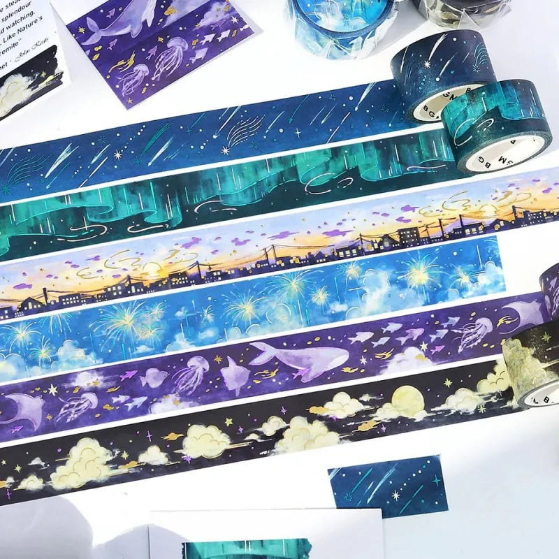 BGM Foil Stamping Masking Tape – Sky Encyclopedia 20mm washi tape series
collection showcases watercolor skyscapes adorned with delicate gold foil celestial motifs. A dreamy tribute to the ever-changing sky, from sunrise to sunset.