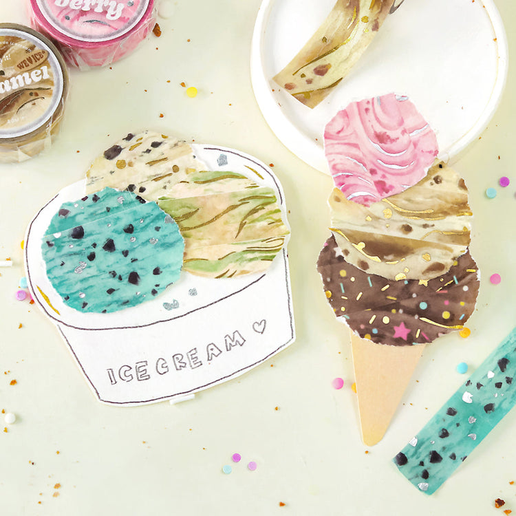 A roll of BGM washi tape in a cookies-and-cream design with foil-stamped cookie specks, styled to resemble the classic dessert, ideal for journaling and creative projects.
