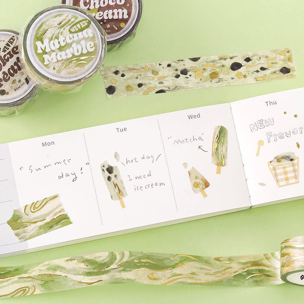 A roll of BGM washi tape in a matcha marble design with foil accents, inspired by green tea ice cream. Perfect for journaling, scrapbooking, and creative decoration.