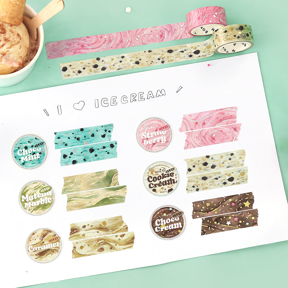 A roll of BGM washi tape in a matcha marble design with foil accents, inspired by green tea ice cream. Perfect for journaling, scrapbooking, and creative decoration.