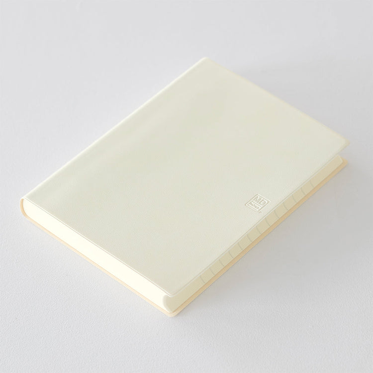 MD Notebook Diary (A5) 1 Day 1 Page 2026 with a minimalist PVC cover, year-stamped spine, and index tabs for each month. The diary is open to show a clean daily page layout on premium MD PAPER, ideal for journaling or planning.