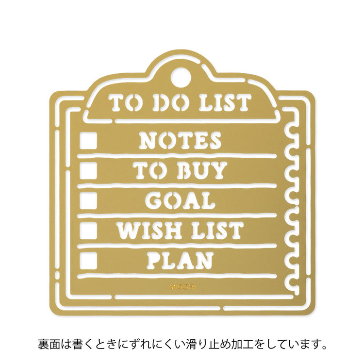 A brass stencil with memo-style motifs including headings and to-do boxes designed for making tidy lists in planners, notebooks, or memos.