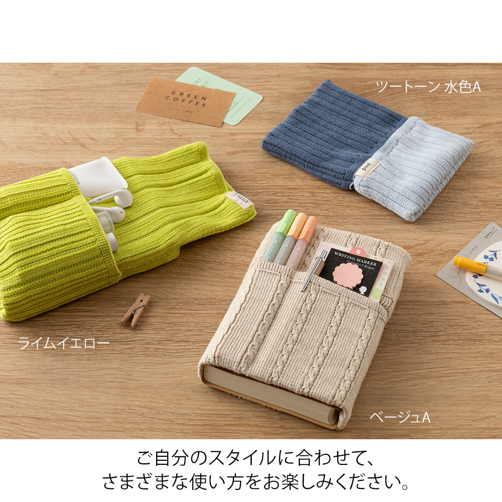 Midori Notebook’s HARAMAKI A6～B6, a soft cable-knit pouch with flap cover, designed to wrap around a planner like a belly warmer, with stretchable pockets for pens and small essentials.