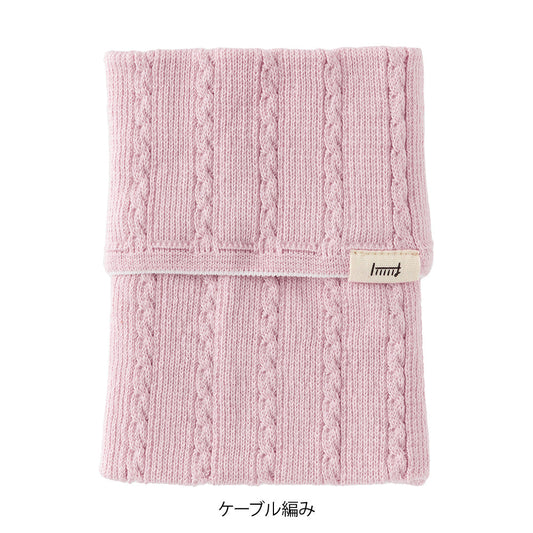 Midori Notebook’s HARAMAKI A6～B6 in Baby Pink, shown in packaging. A soft cable-knit pouch with flap cover, designed to wrap around a planner like a belly warmer, with stretchable pockets for pens and small essentials.