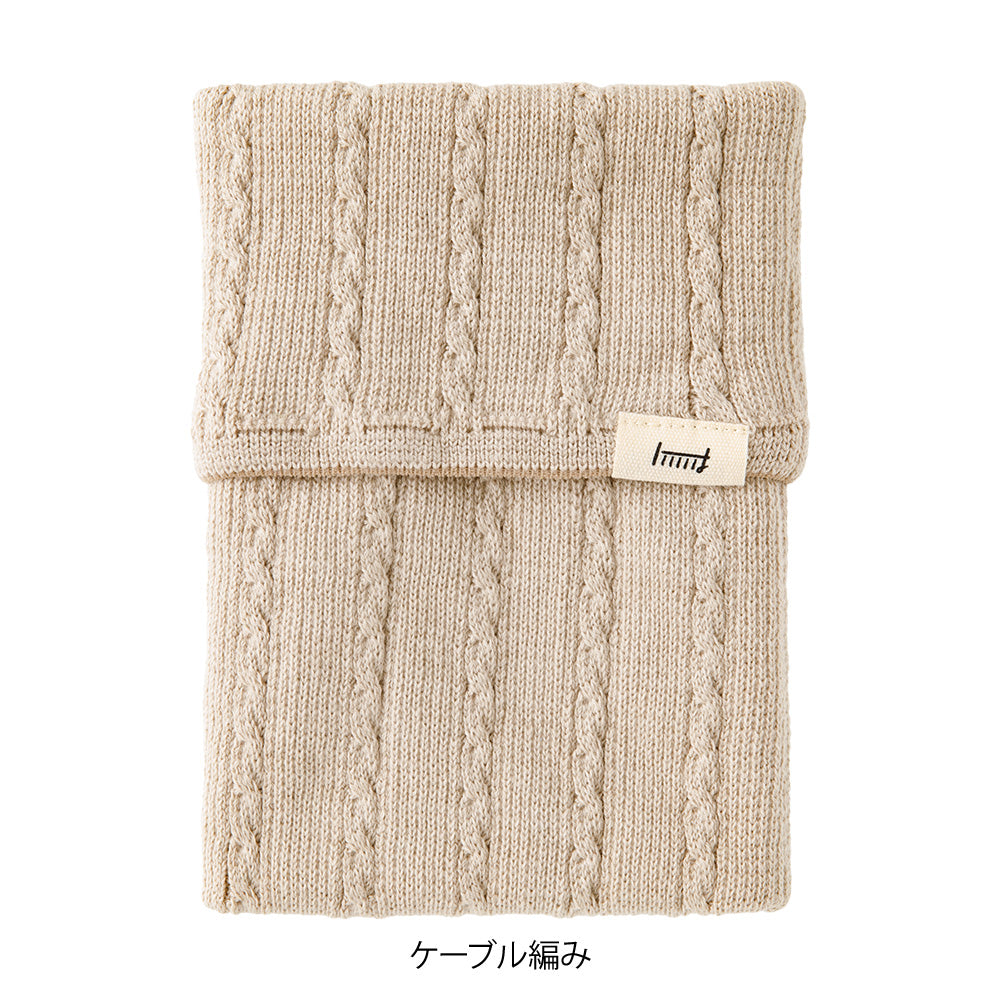 Midori Notebook’s HARAMAKI A6～B6 in Beige, shown in packaging. A soft cable-knit pouch with flap cover, designed to wrap around a planner like a belly warmer, with stretchable pockets for pens and small essentials.
