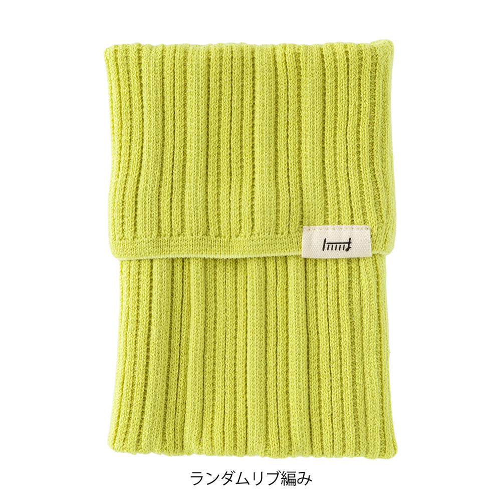 Midori Notebook’s HARAMAKI A6～B6 in Lime Yellow, shown in packaging. A soft cable-knit pouch with flap cover, designed to wrap around a planner like a belly warmer, with stretchable pockets for pens and small essentials.