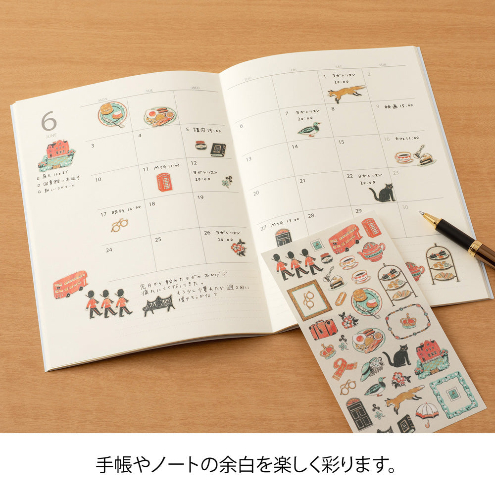 Sheet of Midori washi stickers illustrated by Yuuka Takamaru, featuring soft-toned British motifs such as teacups, flowers, patterned frames, and iconic landmarks. The elegant designs evoke the charm of British culture and are perfect for decorating planners and journals.