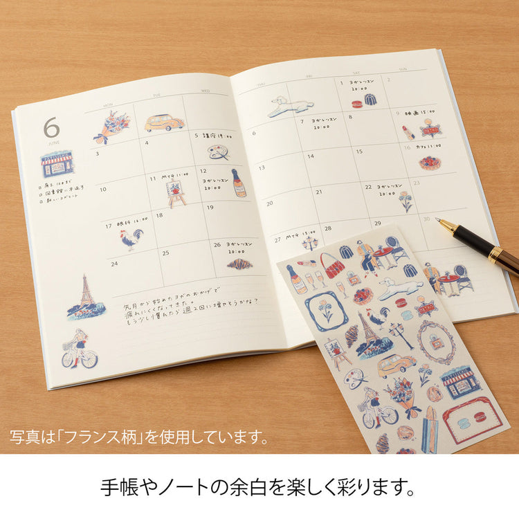 A sheet of Midori Korean Motifs washi stickers by Yuuka Takamaru, showcasing delicate illustrations of hanbok patterns, tigers, lotus flowers, and traditional foods, rendered in soft pastel tones that capture the charm of Korean culture.