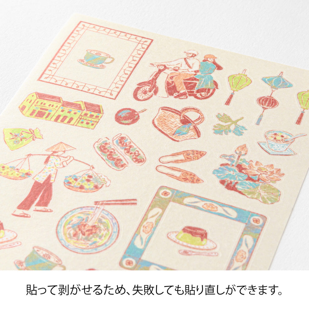 A sheet of Midori Sticker 2718 featuring delicate washi stickers of Vietnamese motifs, including conical hats, lotus flowers, foods, and traditional frame patterns in Yuuka Takamaru’s soft, pastel color palette.