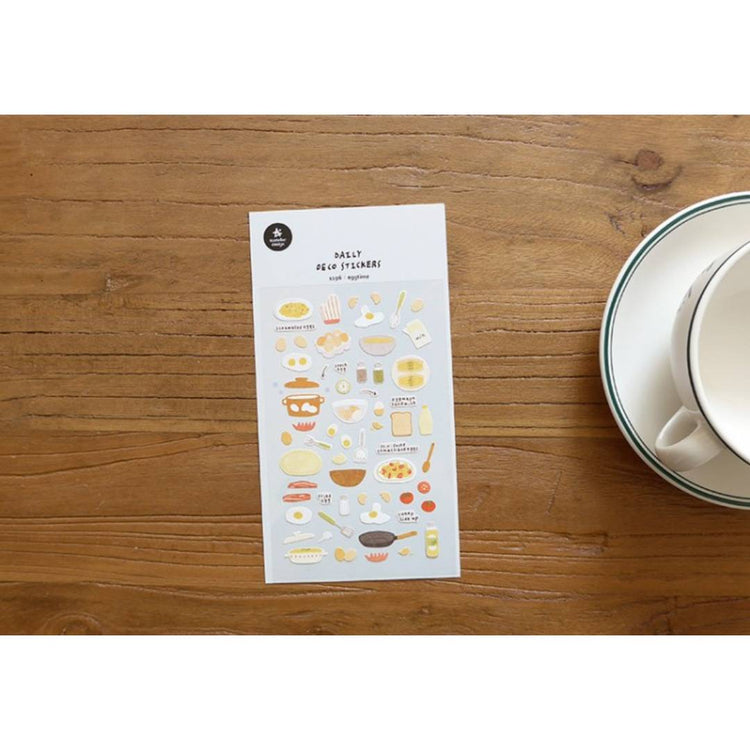 Suatelier Daily Deco Sticker Eggtime sheet featuring hand-drawn eggs, frying pans, and breakfast cooking motifs.