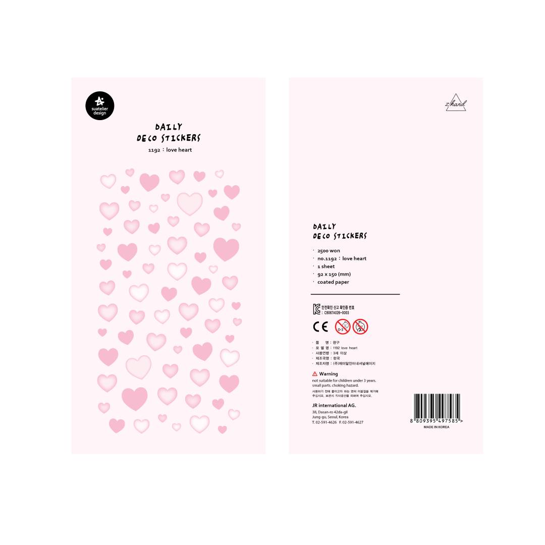 A single sheet of Suatelier Daily Deco Sticker – Love Heart, featuring rows of hand-drawn heart illustrations in different shapes, colors, and sizes on translucent paper.