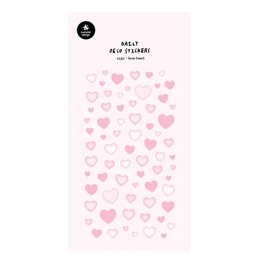 A single sheet of Suatelier Daily Deco Sticker – Love Heart, featuring rows of hand-drawn heart illustrations in different shapes, colors, and sizes on translucent paper.