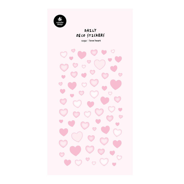 A single sheet of Suatelier Daily Deco Sticker – Love Heart, featuring rows of hand-drawn heart illustrations in different shapes, colors, and sizes on translucent paper.