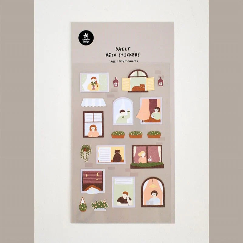 Suatelier Daily Deco Sticker Tiny Moments sheet featuring cozy window illustrations of people and plants in everyday scenes.